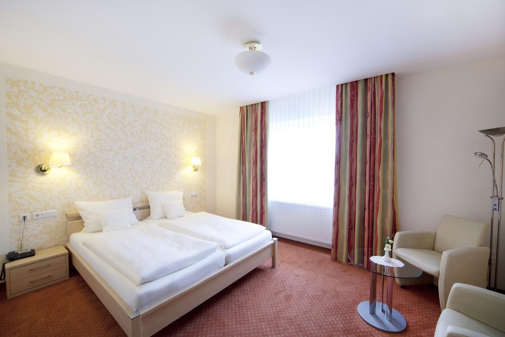 City-Hotel Фризойте Стая снимка